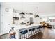 Modern kitchen with white cabinets, quartz countertops, and stainless steel appliances at 1014 Sterling St, Indianapolis, IN 46201