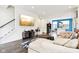 Open concept living room with sectional sofa and kitchen views at 1014 Sterling St, Indianapolis, IN 46201