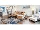 Open concept living room with sectional sofa and view into kitchen at 1014 Sterling St, Indianapolis, IN 46201