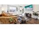 Spacious living room with hardwood floors, large TV, and comfortable seating at 1014 Sterling St, Indianapolis, IN 46201