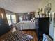 Bright bedroom with large windows, hardwood floors, and ample closet space at 620 Valley Dr, Martinsville, IN 46151