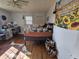 Bedroom with queen bed, hardwood floors, and southwestern decor at 620 Valley Dr, Martinsville, IN 46151