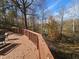 Deck with fall foliage and wooded views; seating area included at 620 Valley Dr, Martinsville, IN 46151