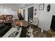 Living room with fireplace and access to the kitchen and stairs at 620 Valley Dr, Martinsville, IN 46151
