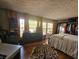 Spacious main bedroom with hardwood floors and large windows at 620 Valley Dr, Martinsville, IN 46151