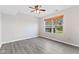 Well-lit bedroom with hardwood floors and a ceiling fan at 100 Silverberry Ct, Mooresville, IN 46158