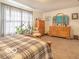 Spacious Primary bedroom with large dresser and plenty of natural light at 304 Chestnut St, Danville, IN 46122