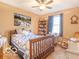 Cozy bedroom with a comfortable bed and built-in shelving at 304 Chestnut St, Danville, IN 46122
