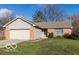 Brick ranch home with attached garage at 304 Chestnut St, Danville, IN 46122