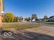 Street view of home with autumn trees at 304 Chestnut St, Danville, IN 46122