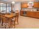 Eat-in kitchen with wood cabinets and stainless steel appliances at 304 Chestnut St, Danville, IN 46122