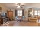 Spacious living room featuring comfortable seating and a cozy fireplace at 304 Chestnut St, Danville, IN 46122