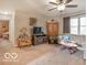 Bright living room with ample natural light and a view into another room at 304 Chestnut St, Danville, IN 46122