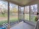 Sunroom with sliding glass doors and view of yard at 304 Chestnut St, Danville, IN 46122