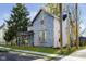 Side view of charming two-story house with weathered siding at 551 Maple Ave, Noblesville, IN 46060