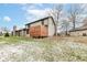 House exterior showcasing a deck and snowy yard at 8191 Frisco Way, Indianapolis, IN 46240