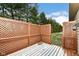 Private deck with lattice panels and winter scene at 8191 Frisco Way, Indianapolis, IN 46240