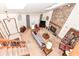 High-ceilinged living room with a fireplace and view of the loft at 8191 Frisco Way, Indianapolis, IN 46240