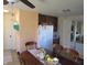 Dining area with a wooden table and chairs near the kitchen at , Greenwood, IN 46143