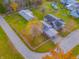 Property featuring a house, shed, and large yard at 943 N 12Th St, Elwood, IN 46036