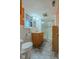 Basement bathroom with shower, toilet, and vanity at 943 N 12Th St, Elwood, IN 46036