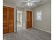 Bedroom with neutral walls, carpet, and double closets at 943 N 12Th St, Elwood, IN 46036