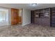 Dining area with tile floors and built-in hutch at 943 N 12Th St, Elwood, IN 46036