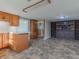 Dining area with tile floor and built-in hutch at 943 N 12Th St, Elwood, IN 46036
