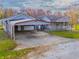 House with carport and a spacious yard at 943 N 12Th St, Elwood, IN 46036