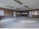 Large garage featuring a double door and overhead storage at 943 N 12Th St, Elwood, IN 46036