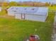 White metal shed with large door and multiple skylights at 943 N 12Th St, Elwood, IN 46036