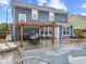 Home's backyard with pool and patio area at 1285 Greenwood Station Blvd, Greenwood, IN 46143