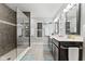 Elegant bathroom with double vanity, large shower, and modern fixtures at 1285 Greenwood Station Blvd, Greenwood, IN 46143