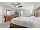 King-size bed in a well-lit Primary bedroom with ensuite bathroom access at 1285 Greenwood Station Blvd, Greenwood, IN 46143
