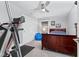 Bedroom with wood bed frame, treadmill, and closet at 1285 Greenwood Station Blvd, Greenwood, IN 46143