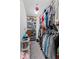 Walk-in closet with ample shelving and hanging space for clothes and shoes at 1285 Greenwood Station Blvd, Greenwood, IN 46143