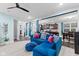Bright and airy living room with sectional sofa and view into kitchen at 1285 Greenwood Station Blvd, Greenwood, IN 46143