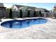 Relaxing inground pool with water features in a backyard setting at 1285 Greenwood Station Blvd, Greenwood, IN 46143