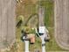 Aerial view of home, detached garage, and large lot with agricultural land at 3265 W 50 S, Lebanon, IN 46052