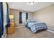 Cozy bedroom featuring a bed, dresser, and natural light at 3265 W 50 S, Lebanon, IN 46052