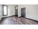 Spacious bedroom with hardwood floors and large window at 425 Sanders St, Indianapolis, IN 46225