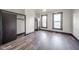 Bright bedroom with wood-look floors and spacious closets at 425 Sanders St, Indianapolis, IN 46225