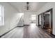 Open living room with hardwood floors and a staircase at 425 Sanders St, Indianapolis, IN 46225