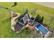 Aerial view of home with pool, large yard, and detached garage at 5784 N 600 E, Greenfield, IN 46140