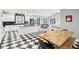 Eat-in kitchen with island and black and white checkerboard floor at 5784 N 600 E, Greenfield, IN 46140