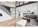 Open floor plan living room with kitchen views and hardwood floors at 5784 N 600 E, Greenfield, IN 46140