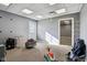 Bright office space with gray walls, carpeted floors, and access to another room at 5784 N 600 E, Greenfield, IN 46140
