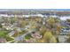 Neighborhood view with lake and autumn colors at 5909 Buttonwood Dr, Noblesville, IN 46062