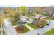 Aerial view of the house and surrounding neighborhood, showcasing autumn foliage at 5909 Buttonwood Dr, Noblesville, IN 46062