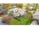 Aerial view of house, backyard, and surrounding neighborhood in autumn at 5909 Buttonwood Dr, Noblesville, IN 46062